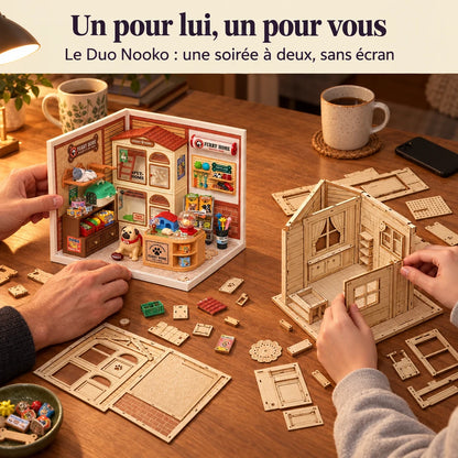 Deux personnes construisent un kit NOOKO côte à côte, une soirée sans écran