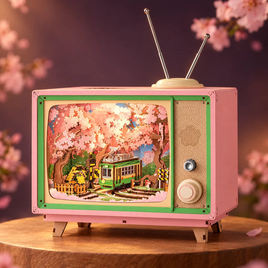Boîte à musique Sakura lumineuse en forme de télé rétro avec tram miniature