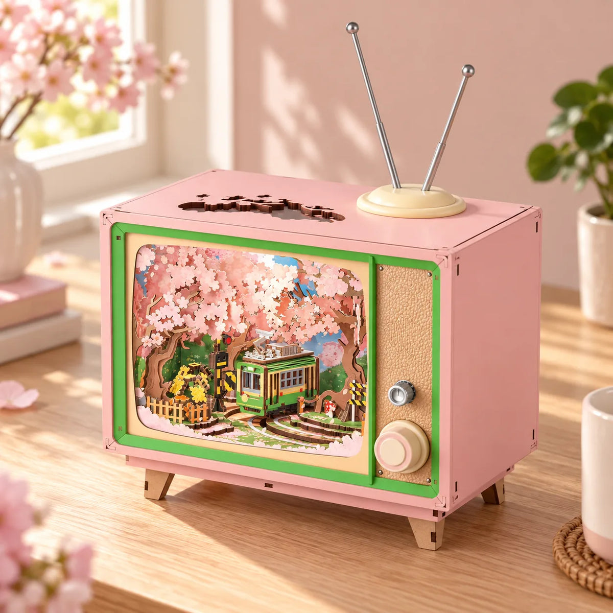 Vue trois quarts de la boîte à musique Sakura et de ses commandes en façade