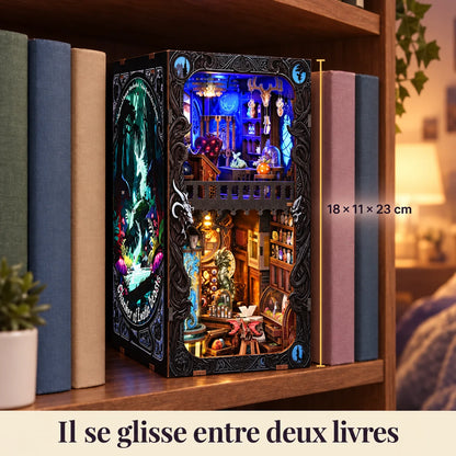Cabinet of Exotic Creatures slipped between two books, dimensions 18 × 11 × 23 cm
