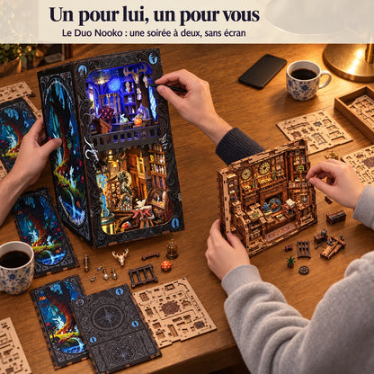 Two people building their NOOKO kits, including the Cabinet of Exotic Creatures