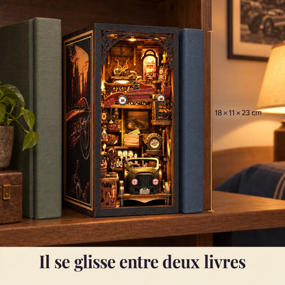 Collector's Garage slipped between two books, dimensions 18 × 11 × 23 cm