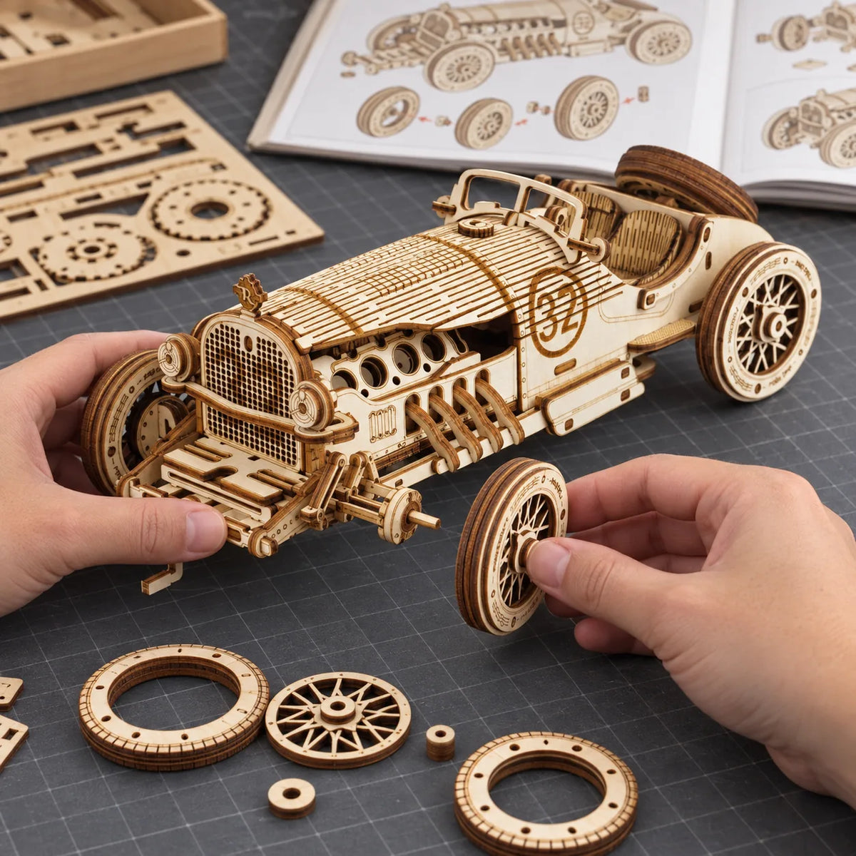 Installation d'une roue à rayons sur la voiture Grand Prix miniature