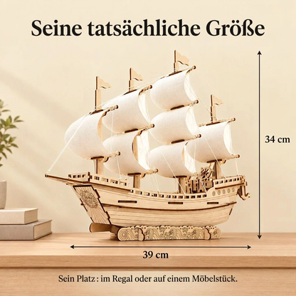 Großsegler mit weißen Segeln im Regal