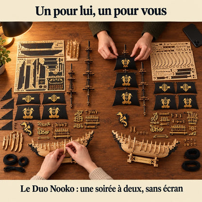 Two people building a NOOKO kit side by side, a screen-free evening