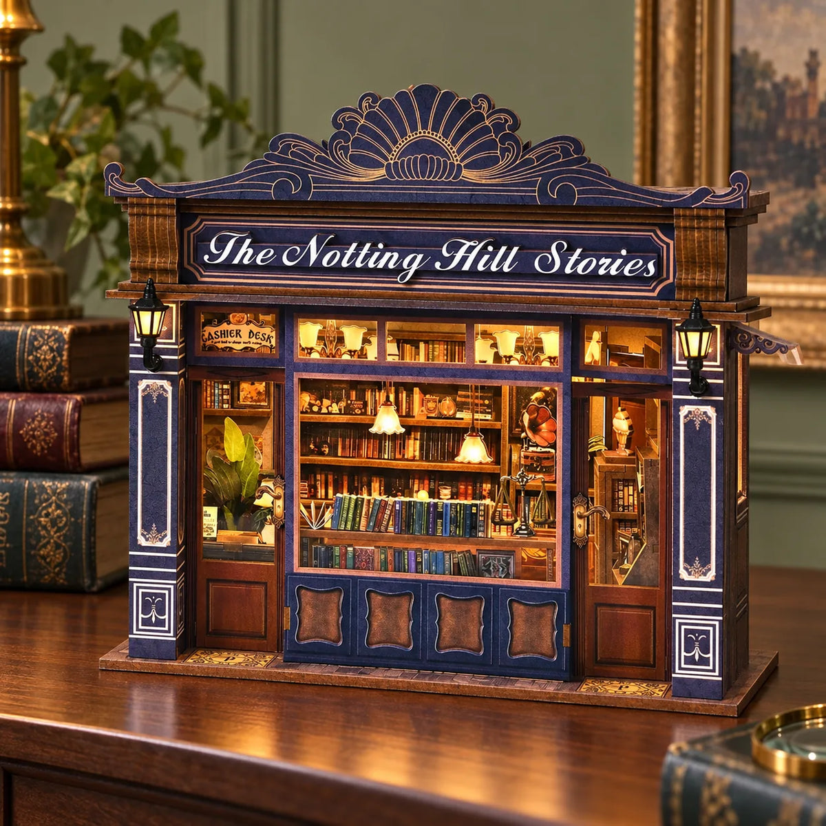 La Librairie de Notting Hill montée et éclairée sur une console en bois