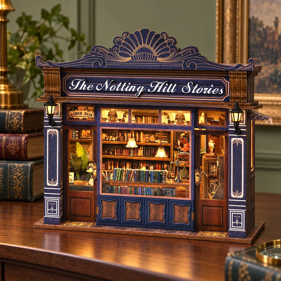 La Librairie de Notting Hill montée et éclairée sur une console en bois