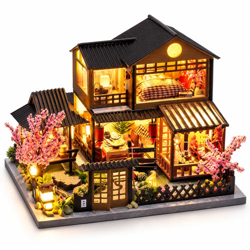 Maison aux Cerisiers NOOKO montée et illuminée sur fond blanc