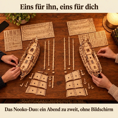 Zwei Personen bauen gemeinsam: das Nooko-Duo