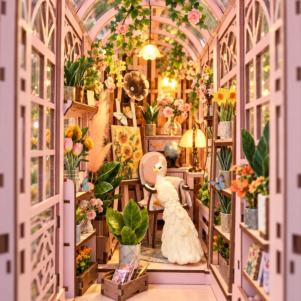 Vue immersive sous la verrière fleurie de La Petite Serre