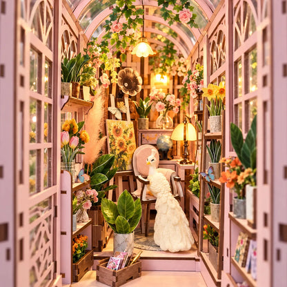 Vue immersive sous la verrière fleurie de La Petite Serre