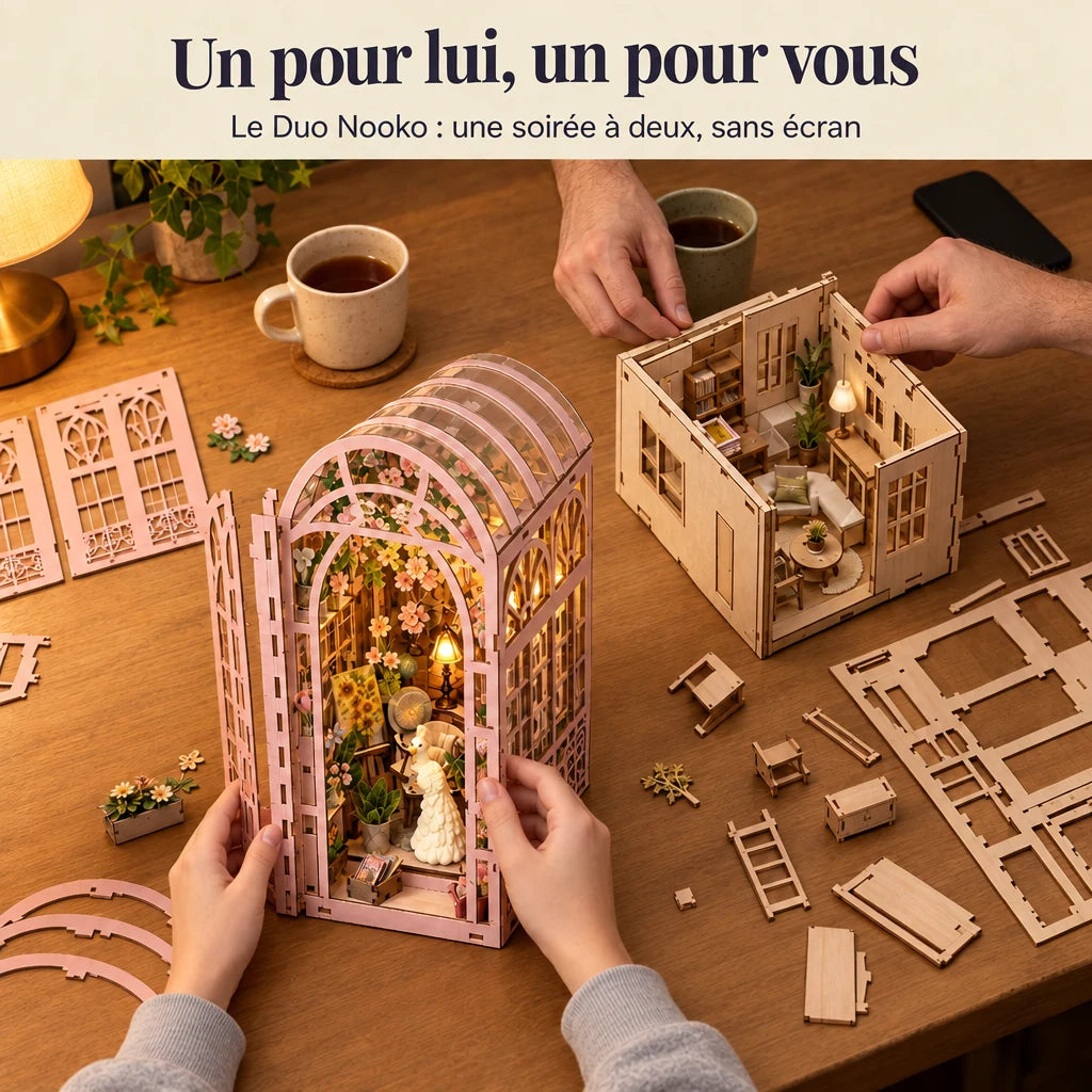 Deux personnes construisent un kit NOOKO côte à côte, une soirée sans écran