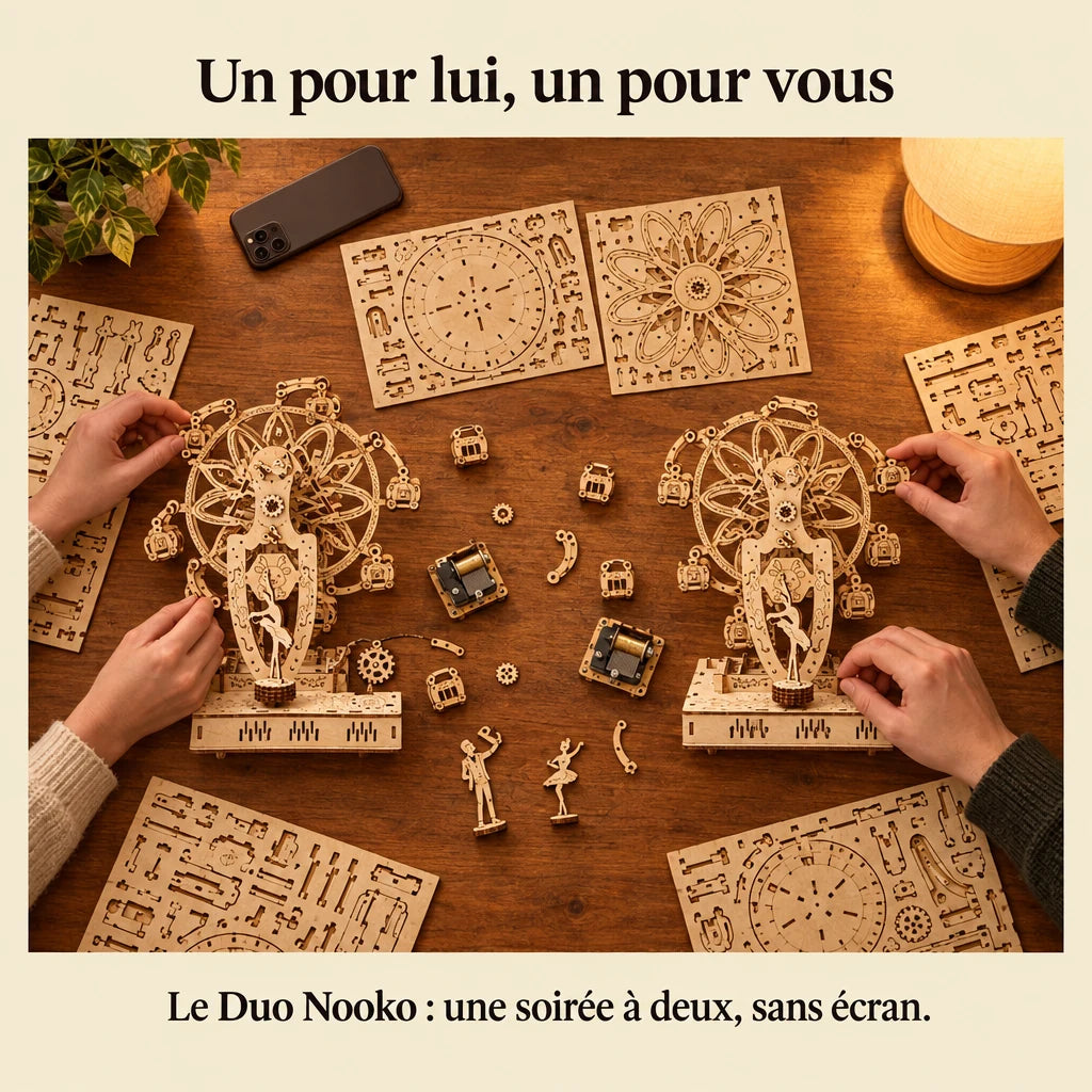 Two people building a NOOKO kit side by side, a screen-free evening