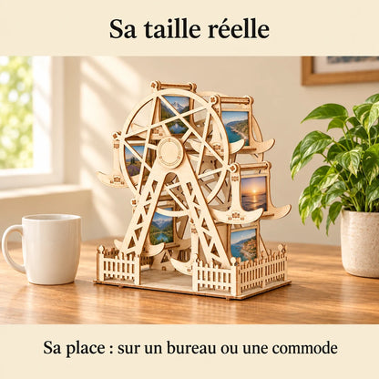 The Photo Holder Ferris Wheel filled with photos, on a desk
