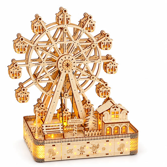 La Grande Roue et son Village Lumineux NOOKO monté et illuminé sur fond blanc