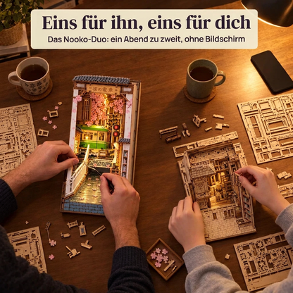 Zwei Personen bauen gemeinsam: das Nooko-Duo