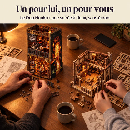 Deux personnes construisent un kit NOOKO côte à côte, une soirée sans écran
