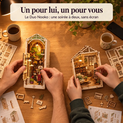 Deux personnes construisent un kit NOOKO côte à côte, une soirée sans écran