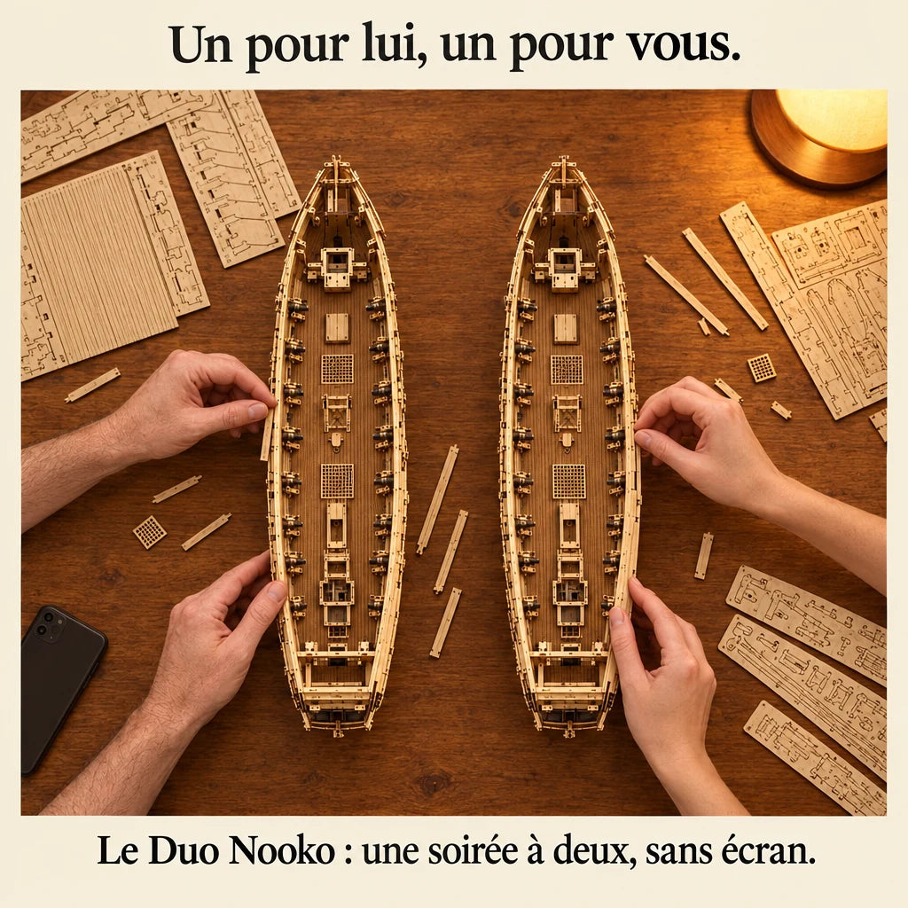 Two people building a NOOKO kit side by side, a screen-free evening